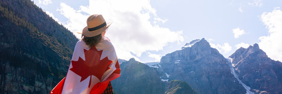 Woman draped in the Canadian flag