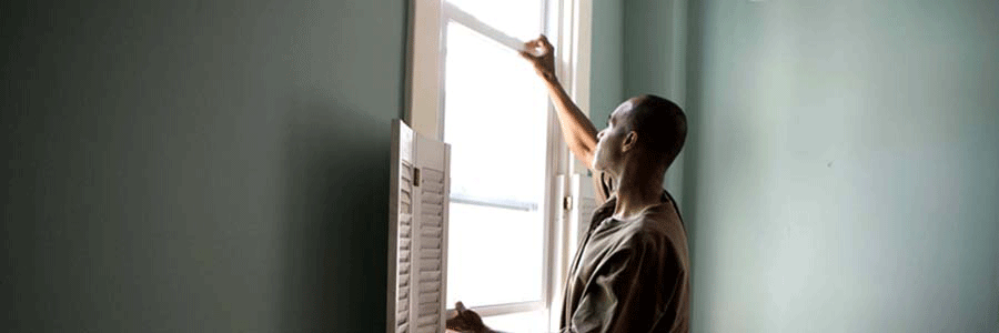man checking windows