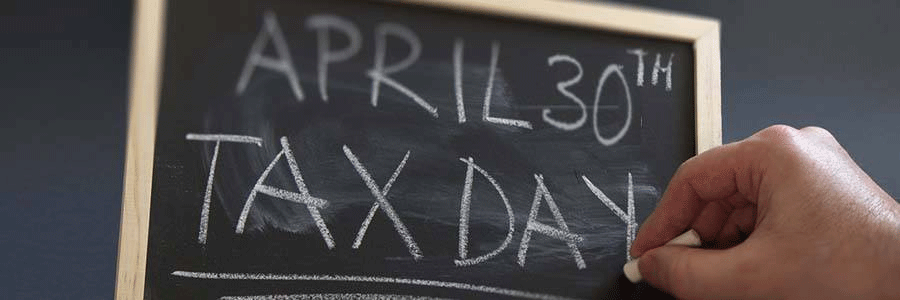 Tax deadline on chalkboard