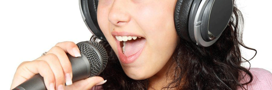 Girl with headphones singing